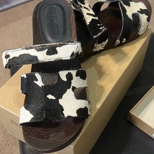 Steve Madden Cowhair Slide Sandals in Black and White